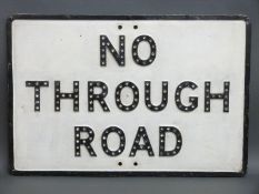 A vintage cast aluminium built up 'no through road' sign with small bullseye reflectors,