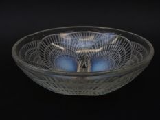 Lalique Coquilles opalescent glass bowl decorated with four shells, signed R. Lalique France N.