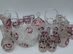 Twenty five pieces of Hofbauer flash overlaid cut glass,