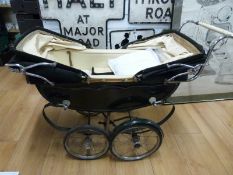 An Allwin coach built twin dolls pram