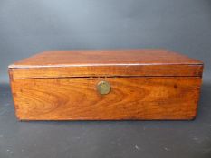 A mahogany storage box with brass handles and Chubb lock