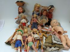 Twenty various dolls, including bisque headed,