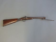 A percussion, converted from flintlock, hammer action blunderbuss with spring loaded bayonet,