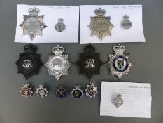 A collection of police badges including Hertfordshire,