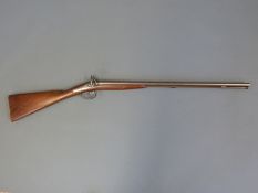 Lacy & Co 18 bore side by side hammer action muzzle loading shotgun with ornately engraved and