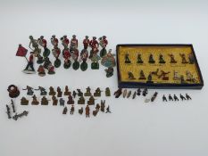 Over 50 Britains and similar lead soldiers and figures including Royal figures, Carman etc.