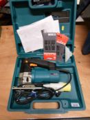 A cased Makita 4304T jigsaw