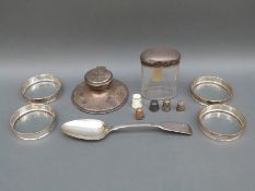 A hallmarked silver capstan inkwell, diameter 11.