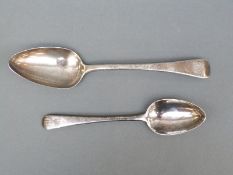 A Georgian hallmarked silver table spoon, length 21.5cm and similar dessert spoon, length 17.