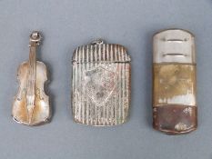 A novelty plated violin vesta case,