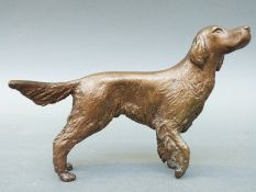 A bronze model of a setter dog, impressed CH in shield,