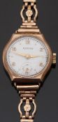 Rotary 9ct gold ladies wristwatch with Arabic numerals, subsidiary seconds dial and white face,