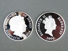 Two silver commemorative coins comprising a 2006 Alderney Charles Davis Lucas Bomarsurd five pound