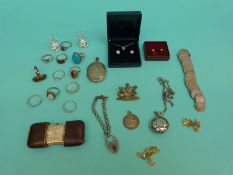 A collection of silver/ white metal jewellery to include a bracelet,