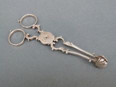 A pair of Georgian silver sugar tongs or nips,