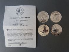 Four various silver Britannia coins