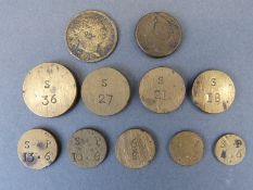 George III spade guinea weight together with nine further coin weights and a contemporary forgery