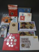 A collection of coin sets etc