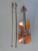 A late 19th/early 20thC violin, with one piece back construction labelled Antonius Straduarius,