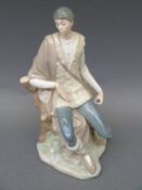 A Lladro figure sitting on a tree stump