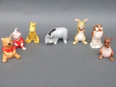 Seven Beswick Disney Winnie the Pooh figures