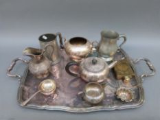 A hallmarked silver tea strainer and stand, weight 95g, Indian possible white metal teaset,