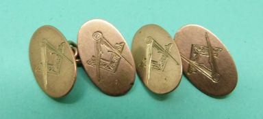 A pair of 9ct gold cufflinks with Masonic symbols, 6.2g.