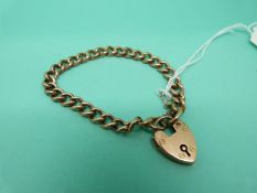 A 9ct gold curb link bracelet with padlock clasp, weight 7.
