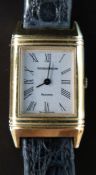 Jaeger LeCoultre Reverso 18ct gold ladies wristwatch with black hands and Roman numerals,