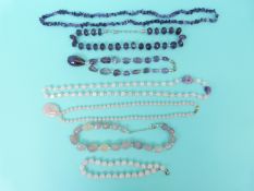 Seven quartz beaded necklaces including rose quartz and amethyst