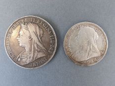 An 1898 veiled head Victorian crown together with an 1899 half crown with 'coincraft' documents,