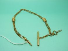 A Victorian yellow metal three strand adjustable watch chain, 31cm long, 14.2g.