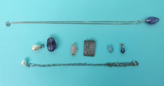 Two amethyst pendants,