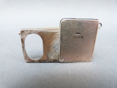 An Edward VII novelty hallmarked silver fold out stamp case formed as a book,