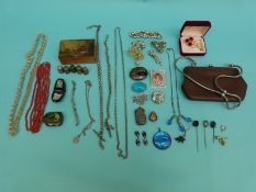 An agate brooch, butterfly wing pendant, hallmarked silver vesta, Charles Horner thimble,