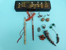 A silver pen with agate handle, Chinese coral rings, amber brooch,
