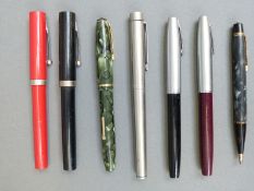 Five Shaeffer and two Conway Stewart fountain pens and propelling pencils including White Dot,