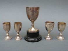 Five various hallmarked silver goblet shaped trophy cups including a pair,