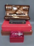 A canteen of cutlery, further cased cutlery, boxed crystal glasses,