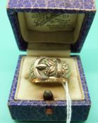 A 9ct gold buckle ring with engraved foliate design, Birmingham 1897, in original box,