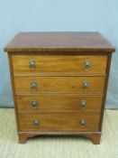 A Georgian mahogany bachelor's chest of four graduated drawers,