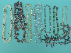 Eight pearl necklaces including irregular freshwater pearls in different colours