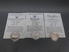 Three USA silver dollars comprising 1993 D-Day, 1990 Eisenhower Centennial and 1993 Silver Eagle,