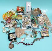 A collection of costume jewellery to include earrings, bangles, beads, necklaces,
