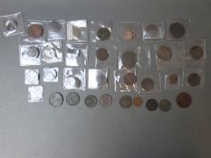 A collection of 18th century onwards tokens, to include workhouse, New Zealand Maori,