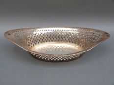 An Edward VII hallmarked silver pierced basket, Sheffield 1912 maker Henry Atkin, weight 229g,