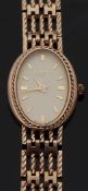 Rotary 9ct gold ladies wristwatch on integral bracelet, case diameter 17mm, 16.8g.