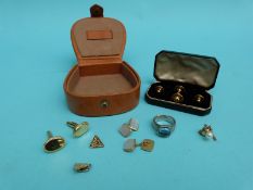 A pair of Christian Dior cufflinks, rolled gold studs,