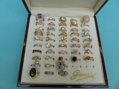 Over 40 rings all set with cubic zirconia