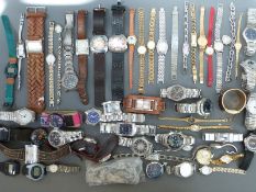 Over 50 various ladies and gentleman's wristwatches.